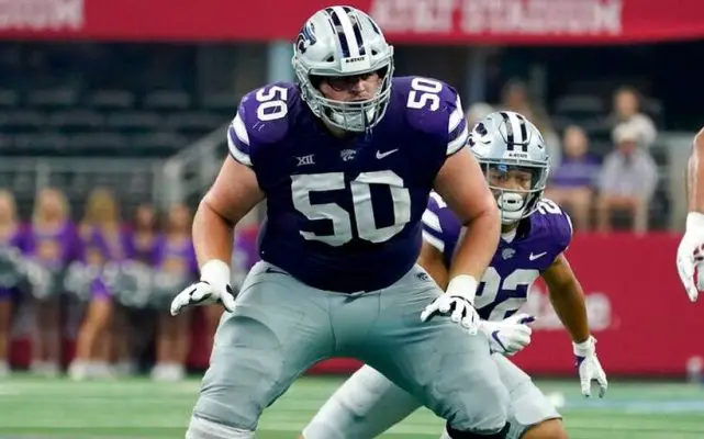 Cooper Beebe protects his backfield in action against the Alabama Crimson Tide